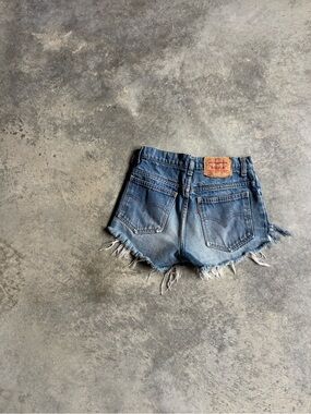 Vintage Levi’s 550 Daisy Duke cut offs made in Belgium 90s orange tab